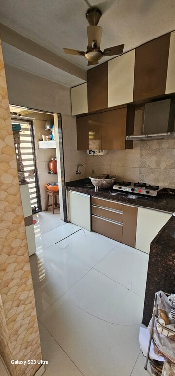 Kitchen in 2 BHK Apartment at Poonam Park View, Virar West – for Sale