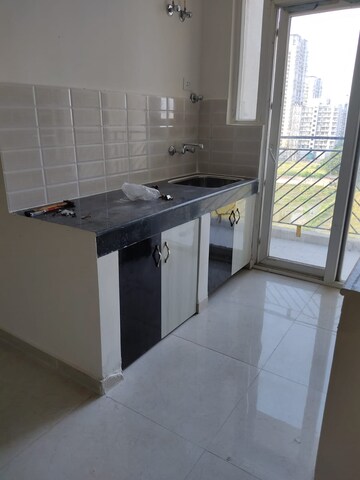Kitchen in 2 BHK Apartment at Pareena Hanu Residency, Sector 68 – for Sale