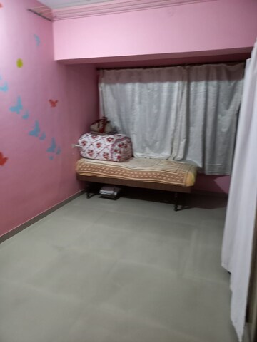 Living Room in 1 BHK Apartment at Kandivali West – for Sale