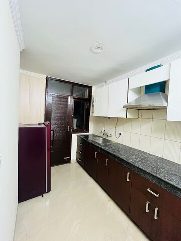 Kitchen in 1.5 BHK Apartment at Ip Extension – for Sale