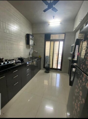 Kitchen in 2 BHK Apartment at New Satara CHS kharghar, Kharghar – for Sale