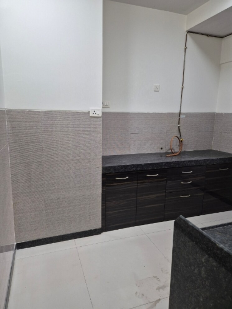 Kitchen, acme-ozone-phase-ii 2 Bedroom 676 Sq.Ft. Apartment In Ghodbunder Road Thane 7388995