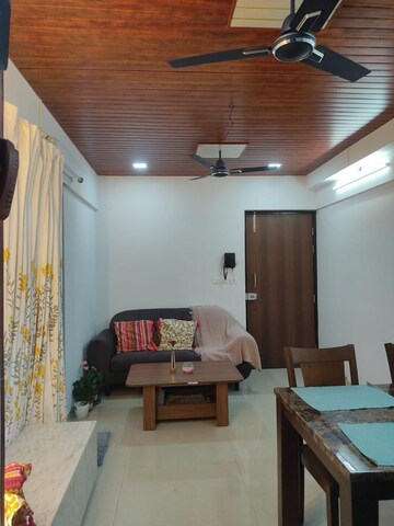 Living Room in 2 BHK Apartment at Lodha Palava City Lakeshore Greens, Dombivli East – for Sale