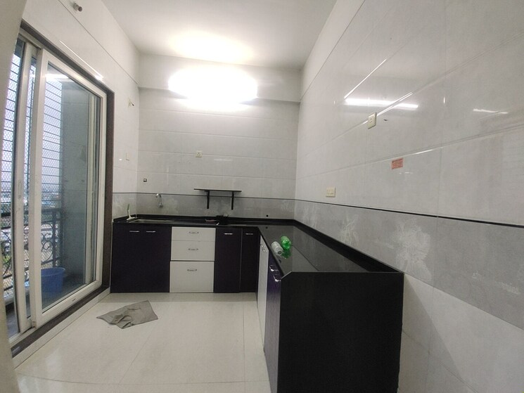 Kitchen, tritan-meadows 3 Bedroom 678 Sq.Ft. Apartment In Sanpada Navi Mumbai 7389493