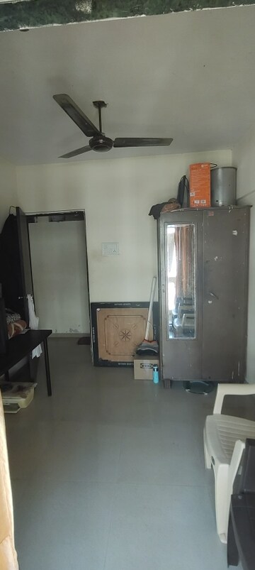 Living Room in 2 BHK Apartment at Hiral Triveni CHS, Mira Road East – for Sale