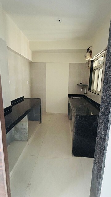 Kitchen in 1 BHK Apartment at Gurukrupa Marina Enclave, Malad West – for Sale