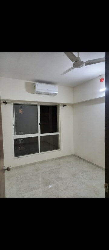 Room in 2 BHK Apartment at Lodha Amara, Kolshet Road – for Sale
