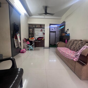 Living Room in 1 BHK Apartment at Parsik Nagar – for Sale
