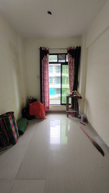Living Room in 1 RK Apartment at Rukmini Garden, Titwala – for Sale