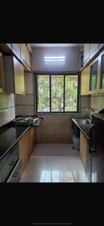 Kitchen in 2 BHK Apartment at Deep Tower, Andheri West – for Sale