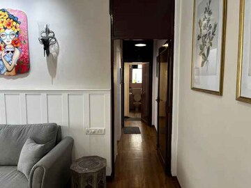 Living Room in 1 BHK Apartment at Midcity Aashna, Bandra West – for Sale