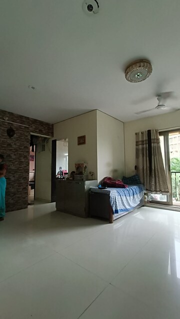 Living Room in 2 BHK Apartment at Parsik Nagar – for Sale