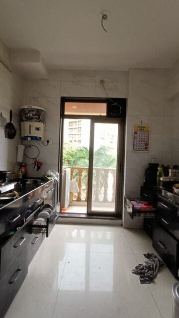 Kitchen in 2 BHK Apartment at Parsik Nagar – for Sale