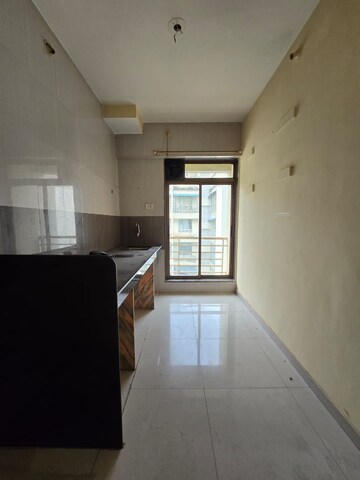 Kitchen in 1 BHK Apartment at Parsik Nagar – for Sale