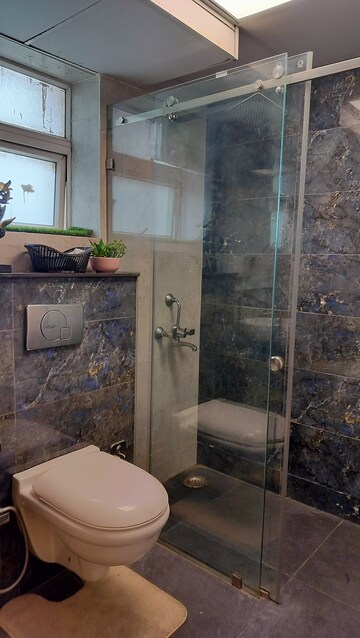 Bathroom in 4 BHK Apartment at Sikka Kaamna Greens, Sector 143a Noida – for Sale