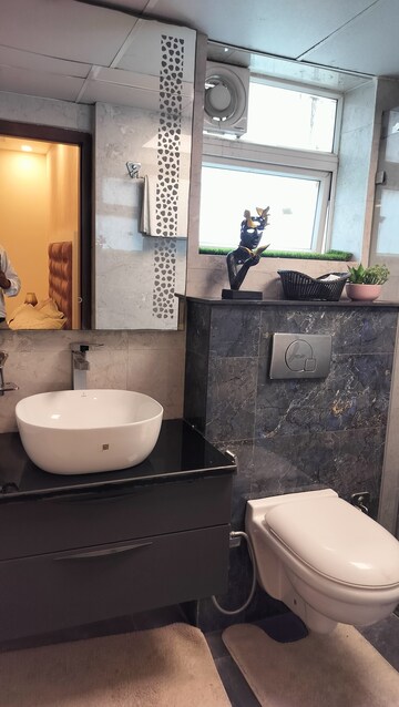 Bathroom in 4 BHK Apartment at Sikka Kaamna Greens, Sector 143a Noida – for Sale