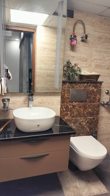 Bathroom in 4 BHK Apartment at Sikka Kaamna Greens, Sector 143a Noida – for Sale
