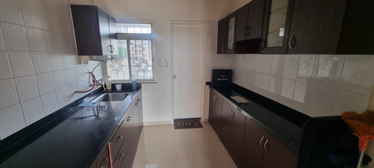 Kitchen, kakkad-ambience-empire 2 Bedroom 1100 Sq.Ft. Apartment In Sopan Baug Pune 7393875