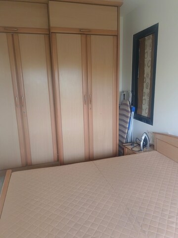 Room in 2 BHK Apartment at Kumar Harshvardhan CHS, Andheri West – for Sale