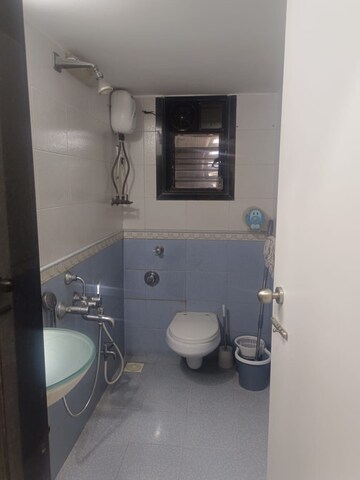 Bathroom in 2 BHK Apartment at Kumar Harshvardhan CHS, Andheri West – for Sale