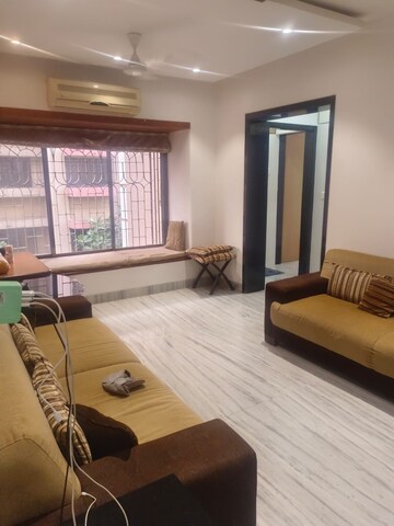 Living Room in 2 BHK Apartment at Kumar Harshvardhan CHS, Andheri West – for Sale