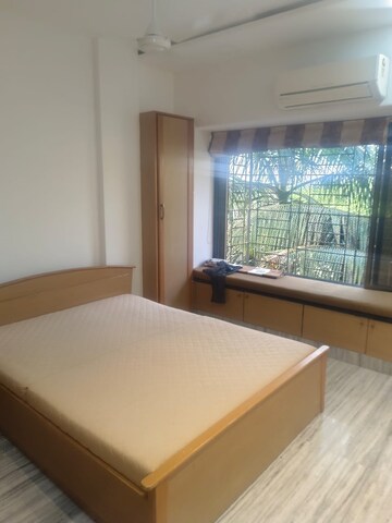 Bedroom in 2 BHK Apartment at Kumar Harshvardhan CHS, Andheri West – for Sale