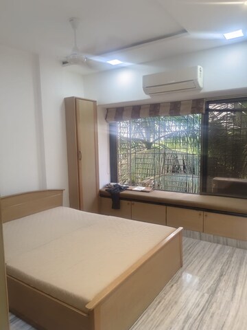 Master Bedroom in 2 BHK Apartment at Kumar Harshvardhan CHS, Andheri West – for Sale
