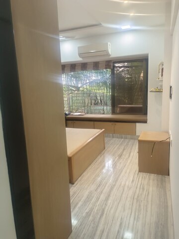 Master Bedroom in 2 BHK Apartment at Kumar Harshvardhan CHS, Andheri West – for Sale