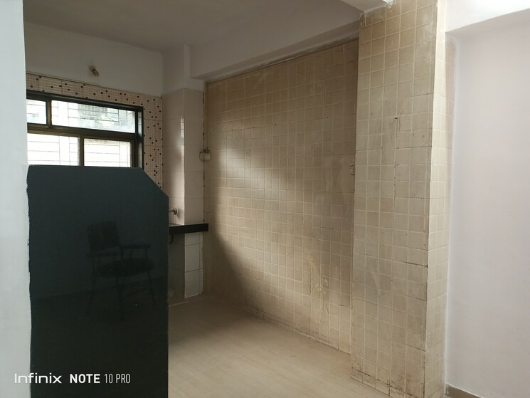 Kitchen, elite-niwas 2 Bedroom 1066 Sq.Ft. Apartment In Kopar Khairane Navi Mumbai 7395161