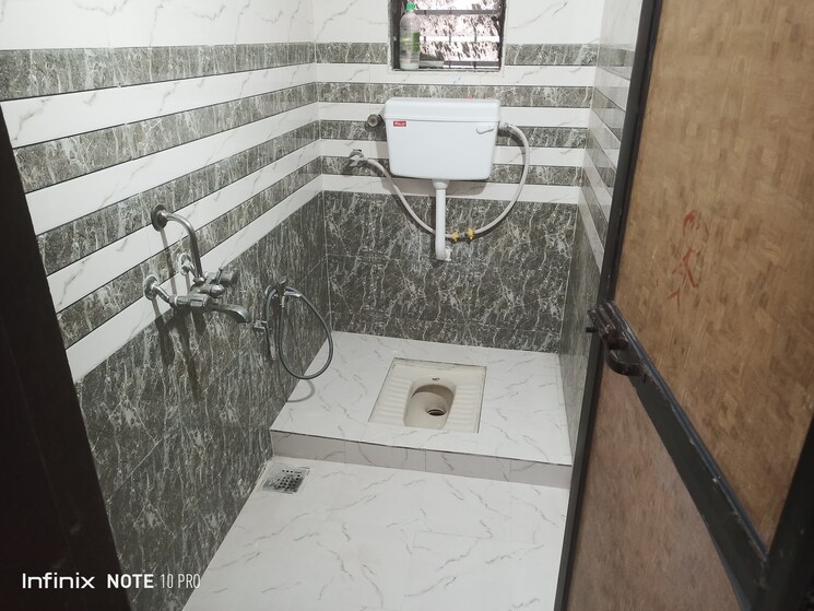 Bathroom, elite-niwas 2 Bedroom 1066 Sq.Ft. Apartment In Kopar Khairane Navi Mumbai 7395161