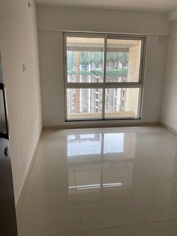 Room in 1.5 BHK Apartment at Godrej Emerald, Ghodbunder Road – for Sale