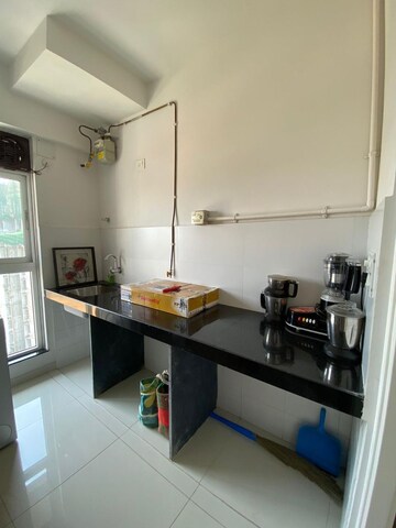 Kitchen in 1.5 BHK Apartment at Godrej Emerald, Ghodbunder Road – for Sale