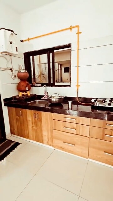 Kitchen in 2 BHK Apartment at Jahangirabad – for Sale