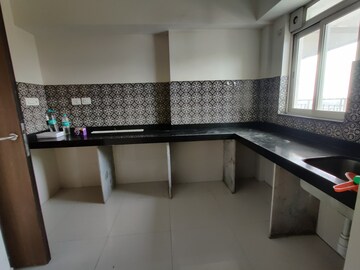 Kitchen in 2 BHK Apartment at Lodha Amara, Kolshet Road – for Sale