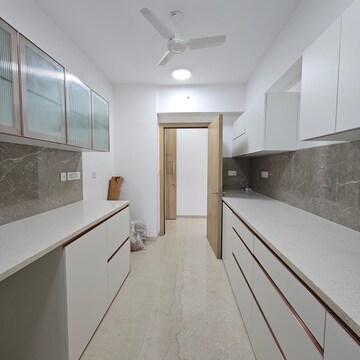 Kitchen in 3 BHK Apartment at Oberoi Sky City, Khande Rao Dongari – for Sale