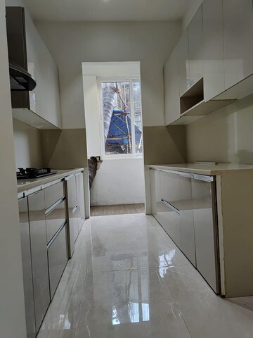 Kitchen in 2 BHK Apartment at Rustomjee Azziano Wing D, Majiwada – for Sale