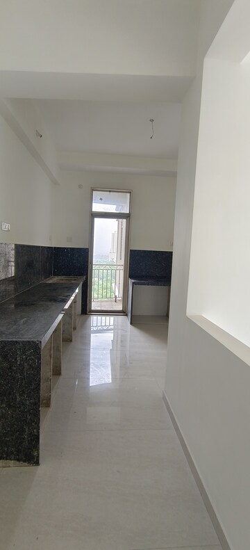 Kitchen in 4 BHK Apartment at Vijay Orion III, Kavesar – for Sale