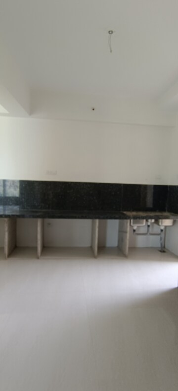 Kitchen in 4 BHK Apartment at Vijay Orion III, Kavesar – for Sale