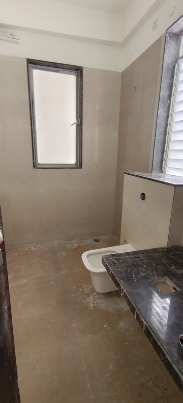 Bathroom in 4 BHK Apartment at Vijay Orion III, Kavesar – for Sale