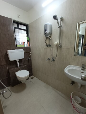 Bathroom in 2 BHK Apartment at Unnathi Woods Phase 1 And 2, Ghodbunder Road – for Sale