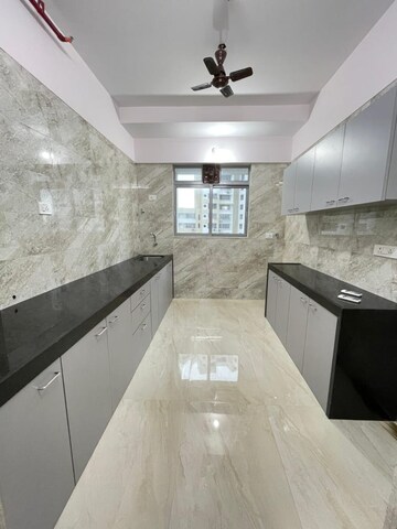 Kitchen in 1 BHK Apartment at Rajesh White City, Kandivali East – for Sale
