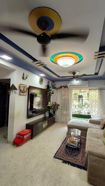 Living Room in 1.5 BHK Apartment at Andheri West – for Sale
