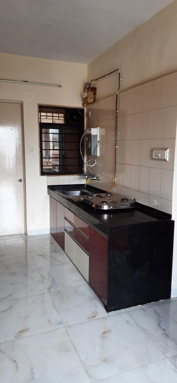 Kitchen in 3 BHK Apartment at Kumar Picasso, Hadapsar – for Sale
