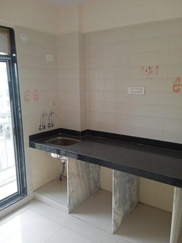 Kitchen in 1 BHK Apartment at Shree Samruddhi Residency, Diva – for Sale
