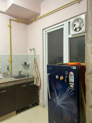 Kitchen in 1 BHK Apartment at Paramount Emotions, Sector 1 Greater Noida – for Rent