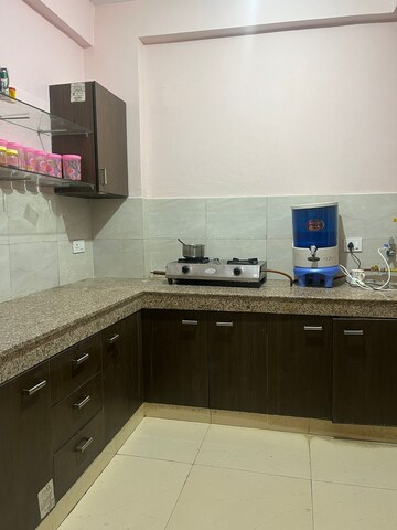 Kitchen in 1 BHK Apartment at Paramount Emotions, Sector 1 Greater Noida – for Rent