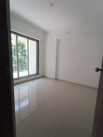 Room in 1 BHK Apartment at Metro Aangan, Badlapur East – for Sale