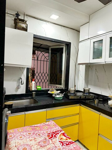 Kitchen in 1 BHK Apartment at Seawoods – for Sale