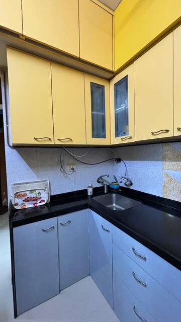 Kitchen in 1 BHK Apartment at Manpada – for Sale