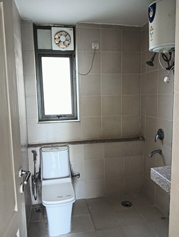 Bathroom in 2 BHK Apartment at Unitech Uniworld Gardens 2, Sector 47 – for Sale